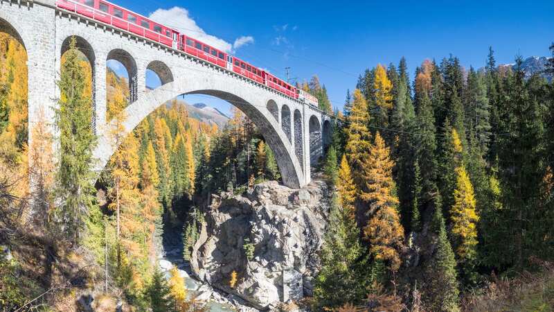 The Bernina Express takes passengers across 196 bridges and 55 tunnels (Image: Getty Images)