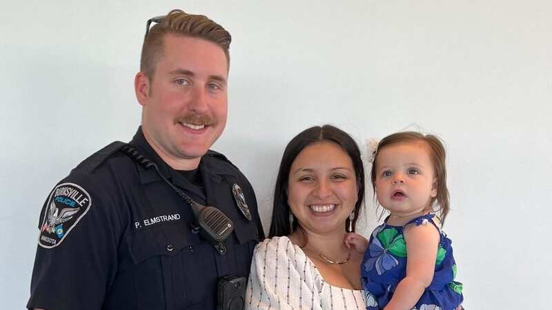 Slain Burnsville police officer Paul Elmstrand with his wife, Cindy, and one of their children (Image: Cindy Elmstrand/Facebook)