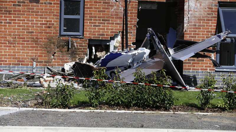 The light aircraft crashed into an unoccupied block of flats near Camp Road in Upper Heyford (Image: Oxford Mail / SWNS)