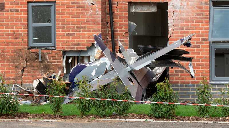 The acrobatic plane crashed into a block of flats (Image: Vagner Vidal/Hyde News & Pictures Ltd)