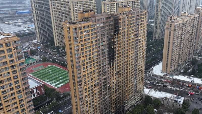 A fire broke out at a residential building in Nanjing city, Jiangsu province, on Friday morning (Image: AFP via Getty Images)