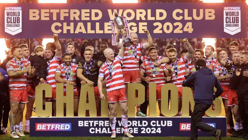Liam Farrell of Wigan Warriors lifts the trophy (Image: Getty Images)