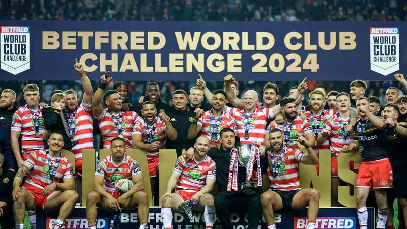 Wigan boss Matt Peet and captain Liam Farrell with their victorious Wigan side after beating Penrith Panthers in World Club Challenge (Image: Paul Currie/SWpix.com)