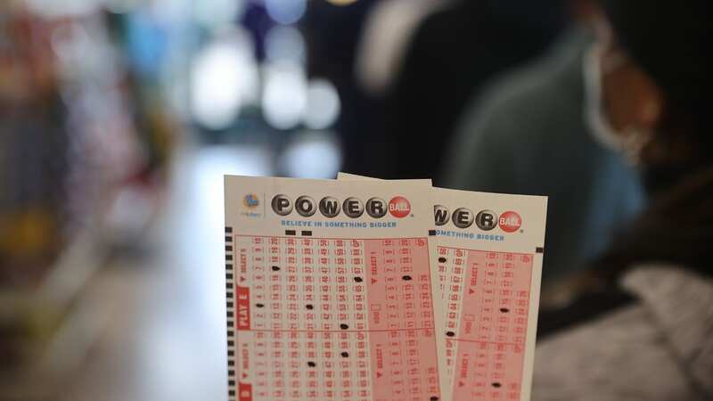 A family won $50,000 after a mum sent her son out to pick their numbers (Image: Anadolu Agency via Getty Images)