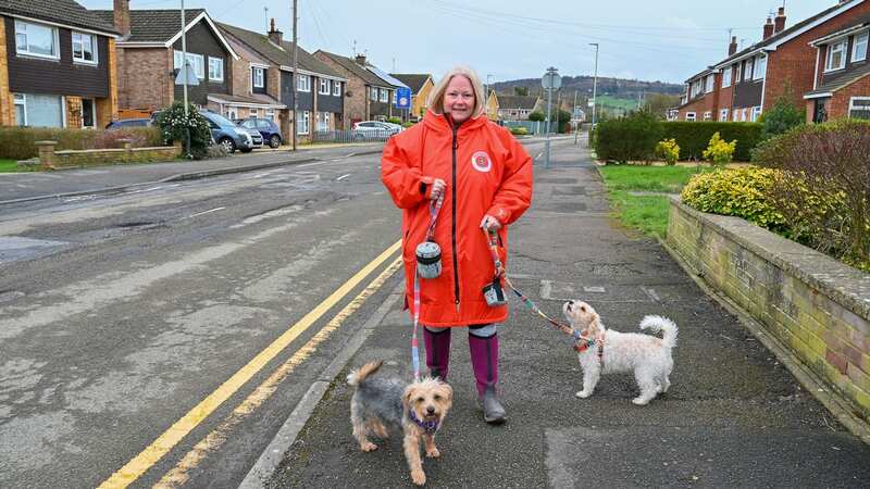 Resident, Natalie White, 49, walking her dogs Esme and Ruby on Caernarvon Road in Cheltenham (Image: No credit)