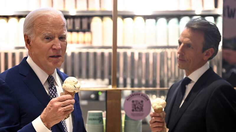 Joe Biden stopped for ice cream with TV host Seth Myers in a taping for his late night show - and announced he believes a ceasefire/hostage deal is close in the Israel-Hamas war (Image: AFP via Getty Images)