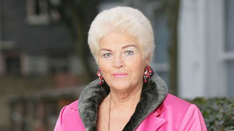 Pam St Clement went behind the bar whilst at a pub recently (Image: Jam Press / McCafferty