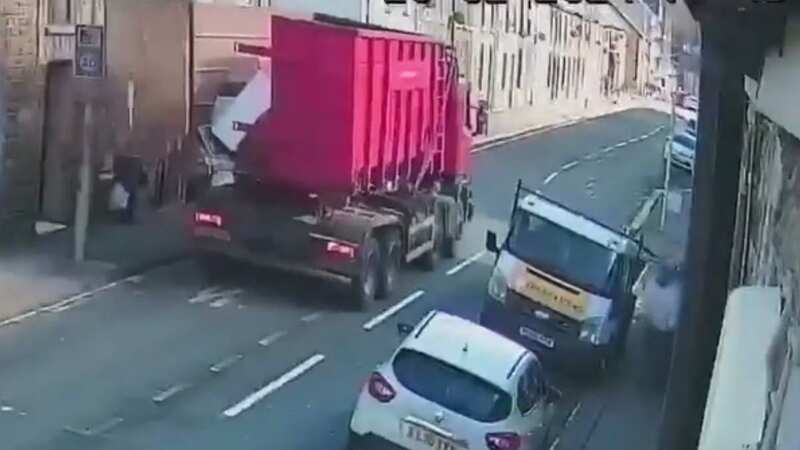 Terrifying moment lorry doors fly open and nearly hit pedestrians
