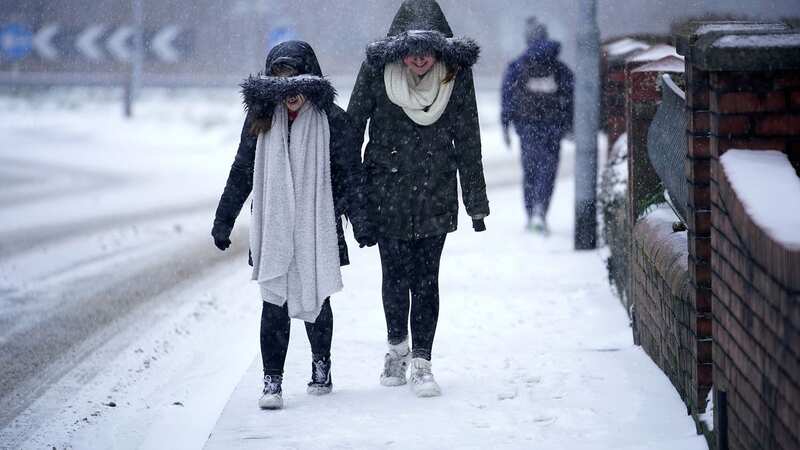 Brits are told to brace for a "wall of snow" set to arrive in the UK on Friday (Image: Getty Images)