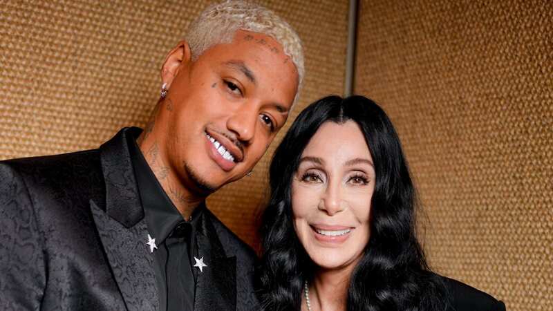 Alexander Edwards and Cher wore matching outfits to Paris Fashion Week (Image: Corbis via Getty Images)