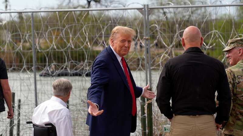 Donald Trump gestures near the bank of the Rio Grande River in Texas (Image: AP)
