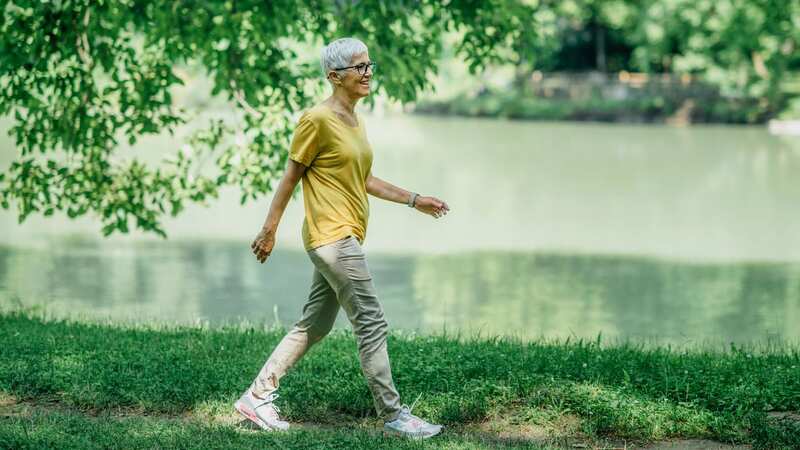 Walking strengthens the heart muscle and reduces the risk of heart disease, say doctors (Image: Getty Images/Science Photo Library RF)
