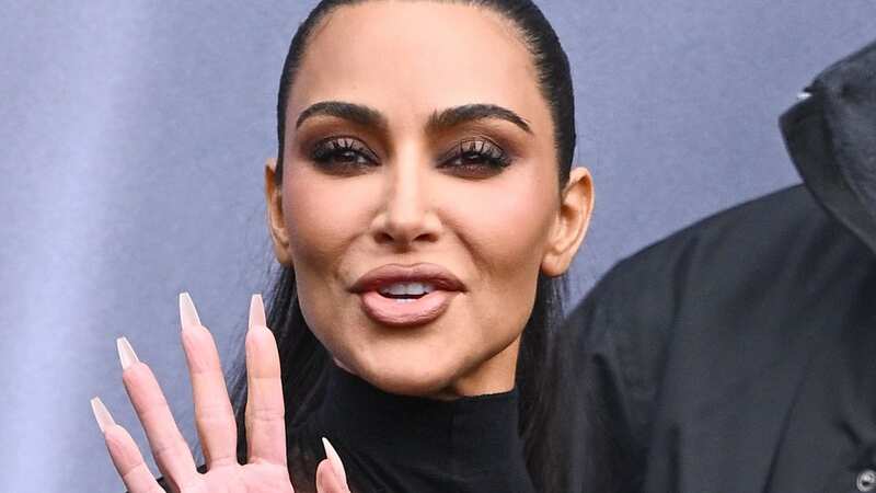 Kim Kardashian forgot to remove the price tag of her Balenciaga dress ahead of the Paris Fashion Week show