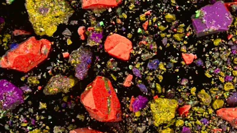 The mineral components of the reddish substance were identified as hematite - as shown by digitally enhanced colours (Image: Federico Zorzi/SWNS)