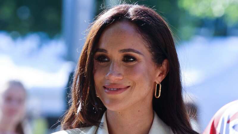 Meghan Markle is said to have been clever with her podcast words (Image: Anadolu Agency via Getty Images)