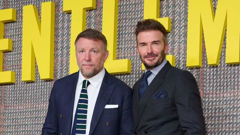Guy Ritchie and David Beckham posed together at the premiere for the director
