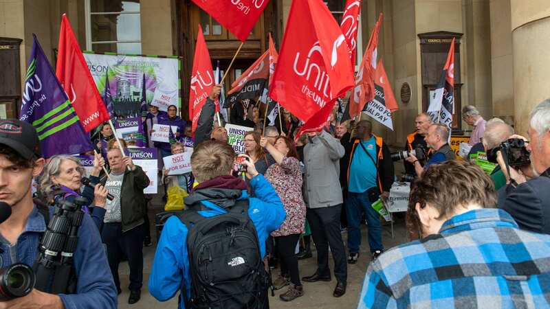 Protesters outside Birmingham City Council as huge cuts were approved (Image: Martin O