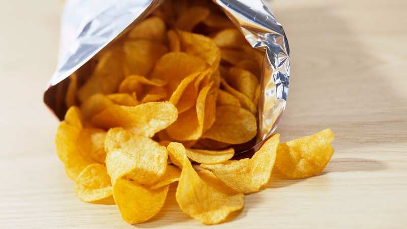 A woman has shared her fury after finding just a handful of crisps in a packet (stock image) (Image: Getty Images/StockFood)