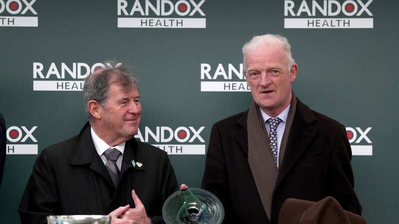 Owner JP McManus pictured with trainer Willie Mullins at Cheltenham (Image: PA)