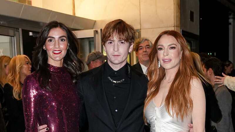 Lindsay and her two siblings posed at the premiere together (Image: Variety via Getty Images)