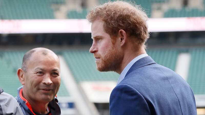 Prince Harry speaks with then-England coach Eddie Jones in his role as Patron of the Rugby Football Union (Image: Kirsty Wigglesworth)