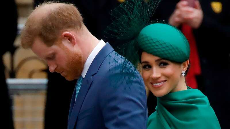 Meghan Marke and Prince Harry stepped back as senior royals in 2020 (Image: AFP via Getty Images)