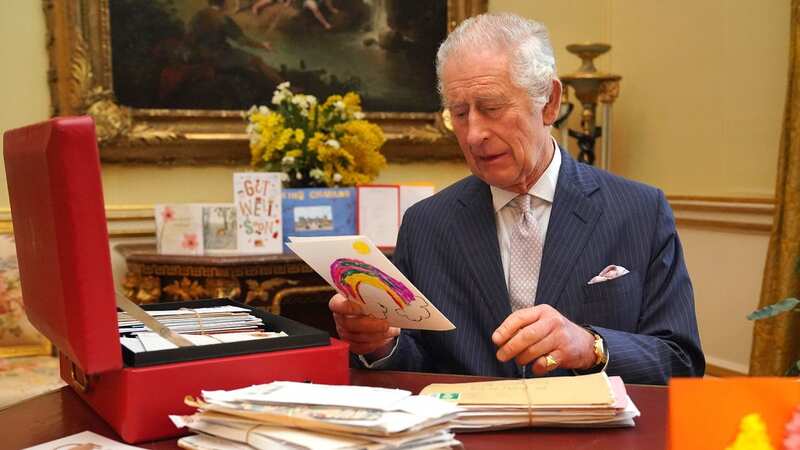 King Charles III reads cards and messages sent by well-wishers following his cancer diagnosis (Image: PA)