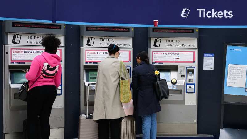 Train passengers queue up to buy tickets (Image: Getty Images)