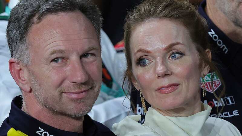 Red Bull Racing team principal Christian Horner (L) along with his wife British singer Geri Halliwell attends the podium ceremony of the podium ceremony of the Saudi Arabian Formula One Grand Prix at the Jeddah Corniche Circuit in Jeddah on March 9, 2024. (Photo by Giuseppe CACACE / AFP) (Photo by GIUSEPPE CACACE/AFP via Getty Images)