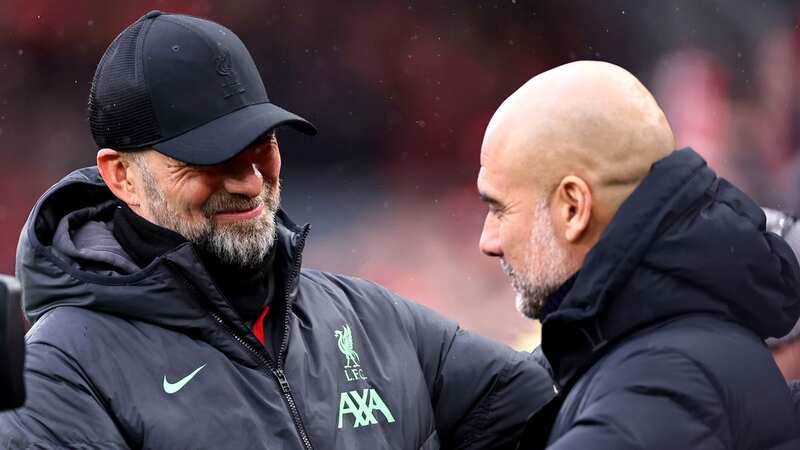 Jurgen Klopp and Pep Guardiola embraced at the final whistle after another thrilling battle (Image: Getty Images)