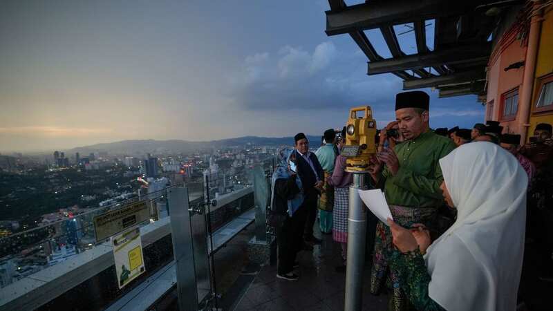Members of the Malaysian Islamic authority perform Rukyah Hilal Ramadan, the sighting of the new moon to determine the start of the holy fasting month of Ramadan in Kuala Lumpur, Malaysia (Image: Vincent Thian/AP/REX/Shutterstock)