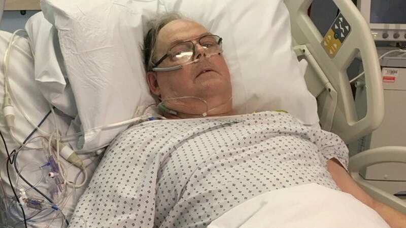 Martin Smith in hospital (Image: Thompsons Solicitors/SWNS)