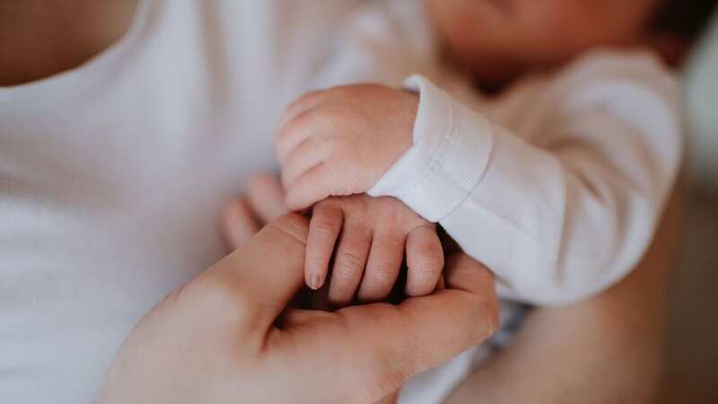 A mum and her baby [file image] (Image: Getty Images)