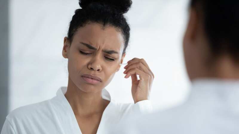 A common ear symptom could be much more serious than you think (stock photo) (Image: Getty Images/iStockphoto)