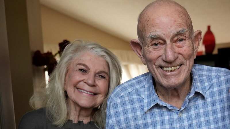 World War II veteran Harold Terens, 100, right, and Jeanne Swerlin, 96, smile for a photo ahead of their June wedding