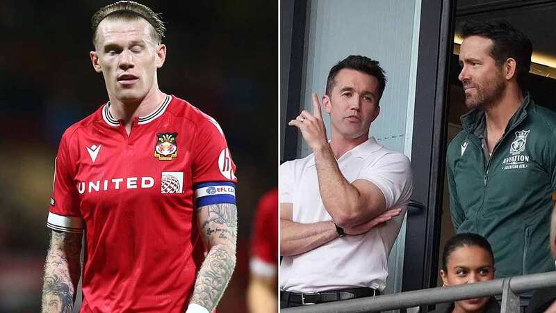 Wrexham owners Ryan Reynolds and Rob McElhenney and fans were left frustrated as they suffered a 0-0 draw against Harrogate Town (Image: OLI SCARFF/AFP via Getty Images)