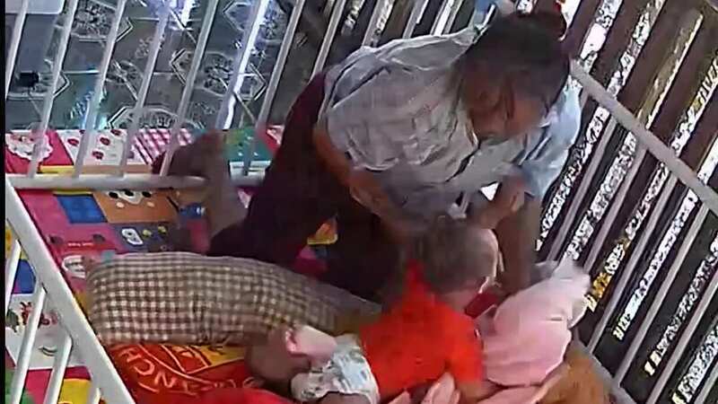 Dramatic moment hero grandmother saves baby from snake attack in his playpen