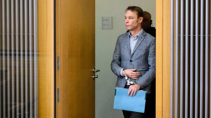 Christian Brueckner, on trial in Germany, arrives in handcuffs (Image: POOL/AFP via Getty Images)
