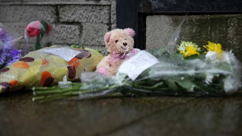 Flowers and tributes are left outside the Hessle Road branch of Legacy Independent Funeral Directors (Image: Getty Images)