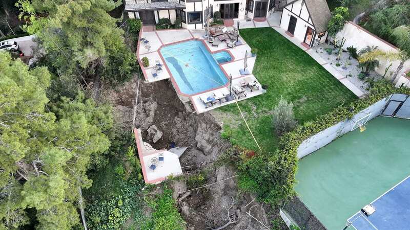A pool on the edge of a garden at a luxury home in LA (Image: Getty Images)