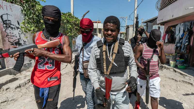 Jimmy Chérizier patrols the streets of Port-au-Prince with gang members (Image: Getty Images)