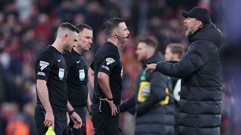 Jurgen Klopp argues with Michael Oliver at the end of Liverpool