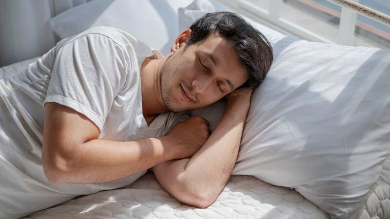 The NHS recommends getting between seven and nine hours sleep each night (Stock photo) (Image: Getty Images)