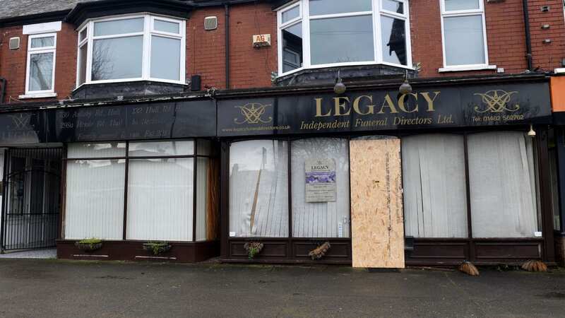 A boarded up door and hanging baskets were torn down at the Legacy Funeral Directors branch (Image: HullLive/MEN)