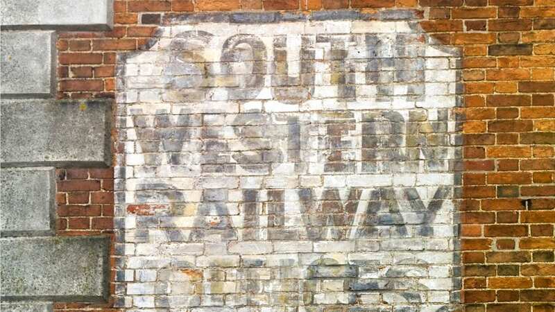 A sign for South Western Railway offices in Plymouth