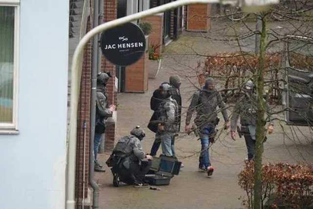 Ede hostages: Multiple people released from city cafe as armed police detain suspect