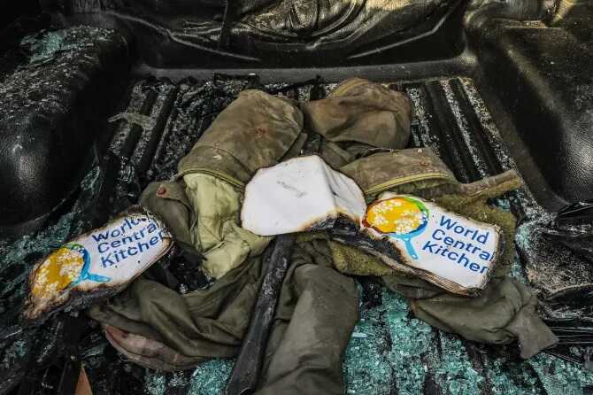 Clothes of members of the World Central Kitchen are seen inside their destroyed car along Al Rashid roadCredit: EPA