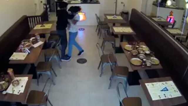 Terrifying moment as ’jealous’ man attempts to slit ex-girlfriend’s throat in restaurant