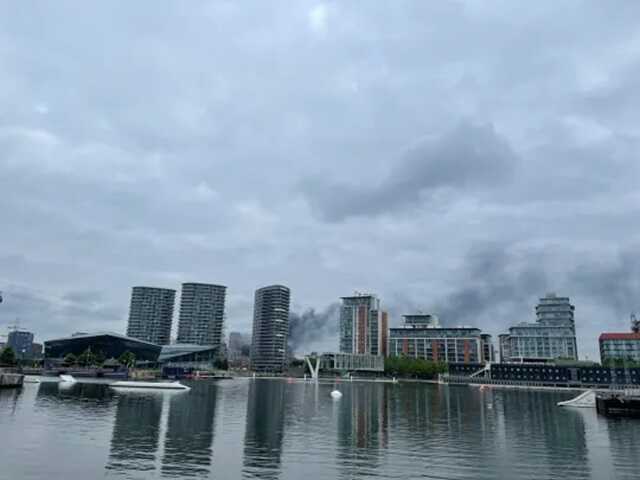 Fire tears through newbuild flats sending acrid smoke through central London