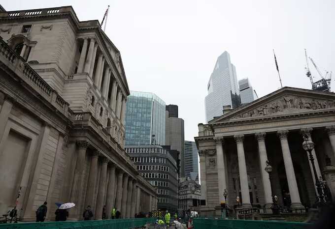 Road construction workers carry out work outside the Bank of England in the City of London financial district in London, Britain, February 13, 2024. REUTERS/Isabel Infantes/File Photo Purchase Licensing Rights